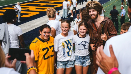 Postgame Photo with the Mountaineer Mascot